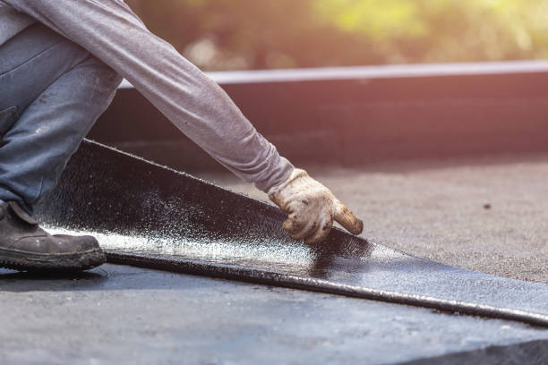 Professional Waterproofing technician working in Gladwyne, PA